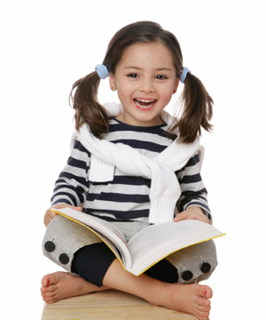 Girl Sitting with book