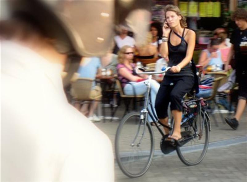 amsterdam bicycling with phone2 (Medium)